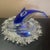 RCR Italy Art Glass 7” Diving Dolphin Sculpture The RCR Italy Art Glass 7” Diving Dolphin Sculpture is a beautifully...