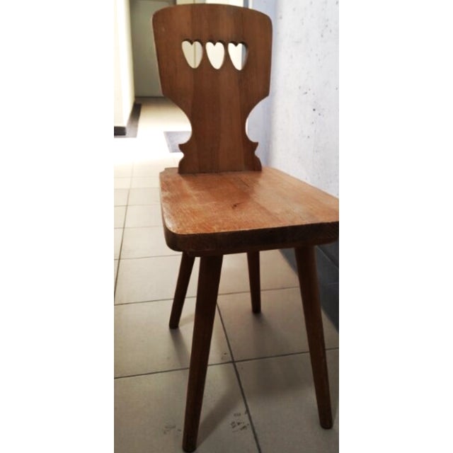 Set of three pinewood chairs from the 1970s. Chairs manufactured in the 1970s for the Cepelia chain of stores. Folk art,...