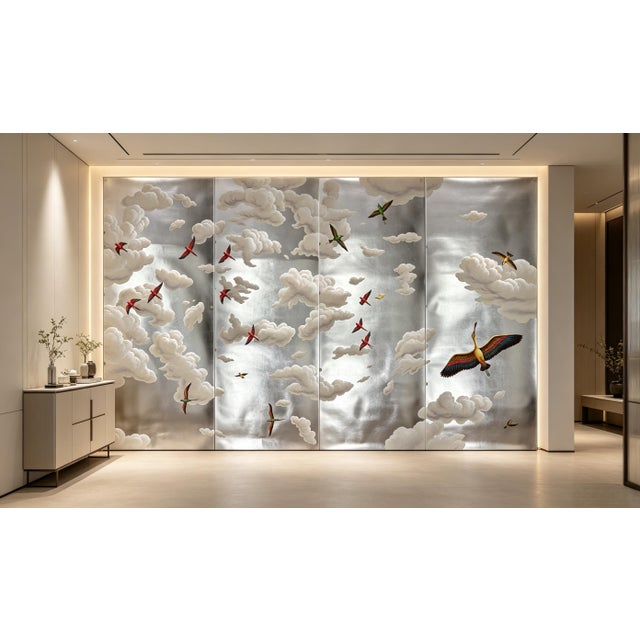 Stunning hand-painted panoramic mural featuring soft fluffy clouds and vibrant soaring birds set against a lustrous silver...