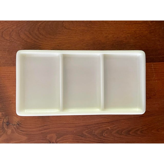 A three part milk glass tray in very good condition.