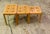 Set of three Danish modern nesting tables by Willy Ryomgard Mobelfabriken. The tables have teak frames, with ceramic tile...