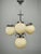 Original Art Deco chandelier produced in Czechoslovakia during the 1930s. Featuring four elegant light champagne glass...