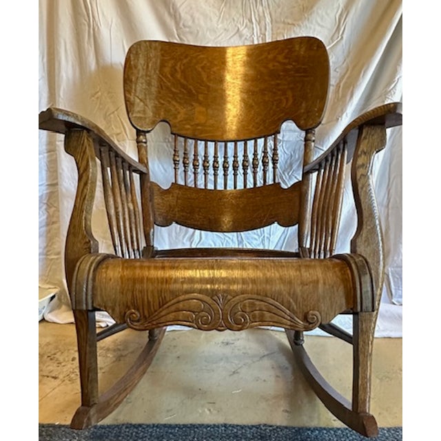 Description: Experience the timeless elegance of the Victorian era with this exquisite 19th-century parlor rocking...