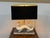 Design Plus Gallery presents the Dragon Table Lamp from Jonathan Adler. The table lamp is simply striking with its white...