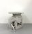 A whimsical vintage elephant-form table intricately constructed from woven rattan and finished in white. The sculptural...