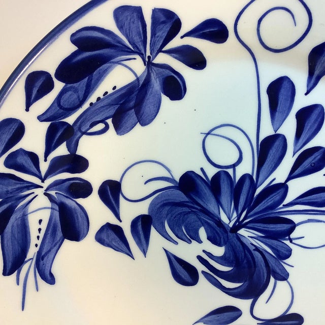 This is a lovely presentation. Offering a hand painted/crafted blue & white plate from Columbia, South America. I love the...