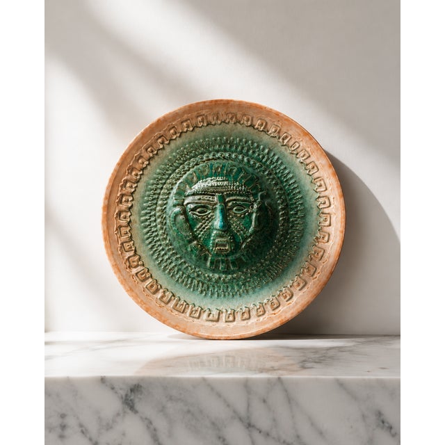 This exceptional, large mid-century modern studio pottery wall platter was handcrafted in the 1970s by the historic...