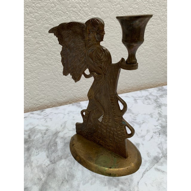 Large vintage textured brass angel candleholder for a taper candlestick with slight aged patina.