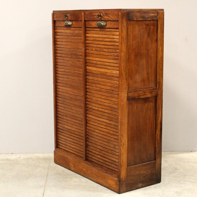 Double-shutter filing cabinet Made of oak Early 1900s Dimensions: width 83 cm, depth 37 cm, height 120 cm Restored (see...