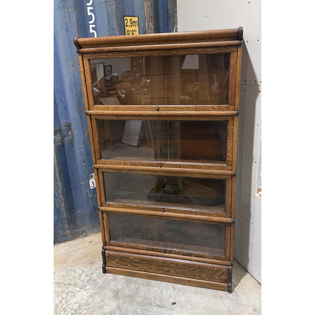 Incredible Globe-Wernicke "C 11 " Tiger Oak Metal Banded Barrister Grade 299 Elastic bookcase! The doors lift up and pull...