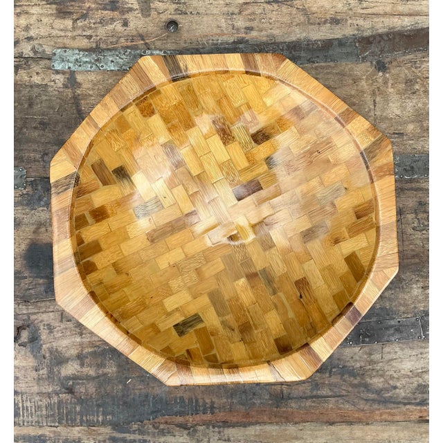 This exquisite vintage octagonal bowl is a masterclass in organic geometry, featuring an intricate parquet construction of...