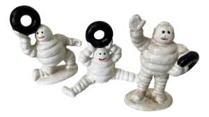 Vintage Cast Iron Michelin Man Models, Set of 3