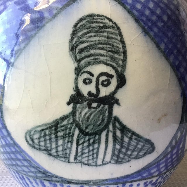 A Persian hand made and hand painted 18th century porcelain vase with image of a Mohammad Karim Khan Zand who was the...