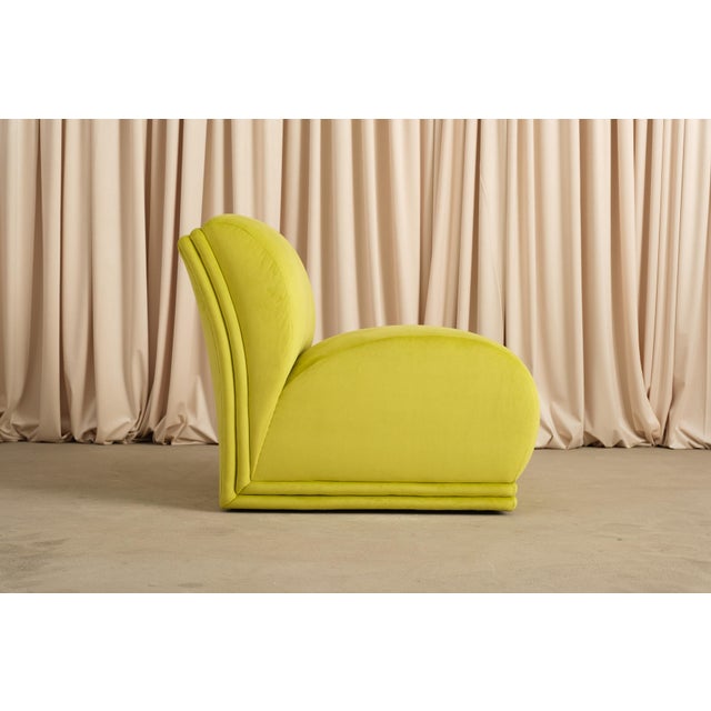 Nobody knows who designed these, and honestly that just makes them more interesting. Armless, deeply cushioned, low-slung,...