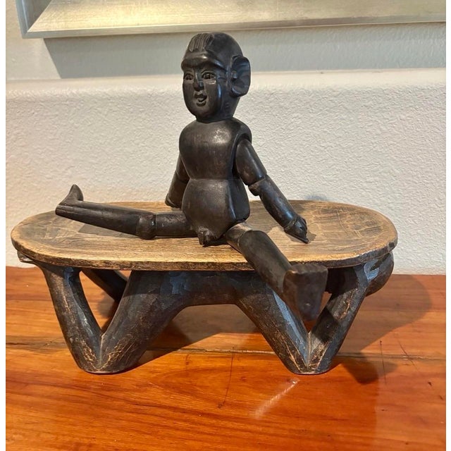 Wonderful ebony wood folk art figure (10.5” high), with articulated arms and legs. He can sit or stand (with a little...