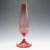 Stylish 'Tulip' vase with elongated, fluting body on a slender column and flaring base in light red and clear coloration....