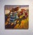 In "Yard Relics," a vibrant array of vintage toys, including strollers and wagons, occupies a sunlit patch of grass,...