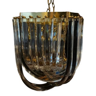 1980s Lucite and Brass Ribbon Chandelier For Sale
