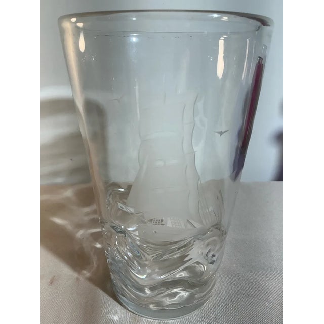 This exquisite crystal vase is a stunning example of Swedish art glass mastery by renowned designer Vicke Lindstrand for...