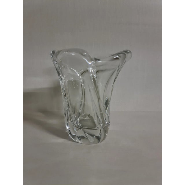 Very nice glass by Daum France, very clear and classic design. Crystal glass marked ''Daum France''. This piece has an...