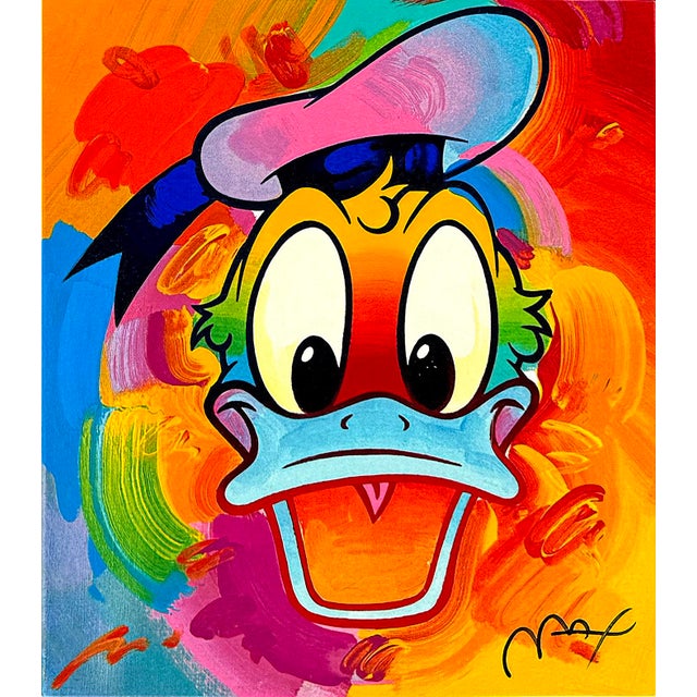 Serigraph in colors on paper. Hand signed lower right by Peter Max. Hand numbered 448/500 lower left. Please note the...