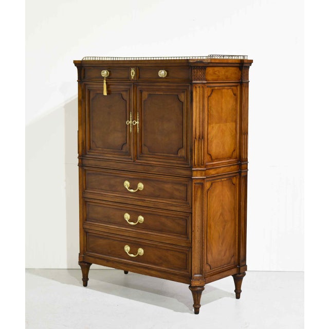 Elegant and refined, this mid-century French Regency highboy by Karges showcases exceptional craftsmanship and timeless...
