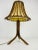 A wonderful teak table lamp made in the 1960s. It is fascinating with its rare lamp shade. The light requires two e27 (us...