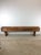 This antique primitive bench features hardwood construction, original natural finish, unique long top with reinforced side...
