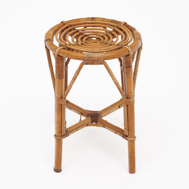 Stool from Vallauris, France made of bamboo. The stool is circular in shape with a spiral bamboo top and bamboo structure....