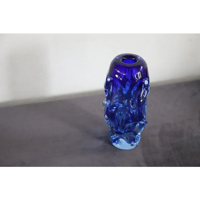 Sweden desgn circa 1940s blown art glass vase in blue colour. A beautiful vase with intense colour of the blue has a...