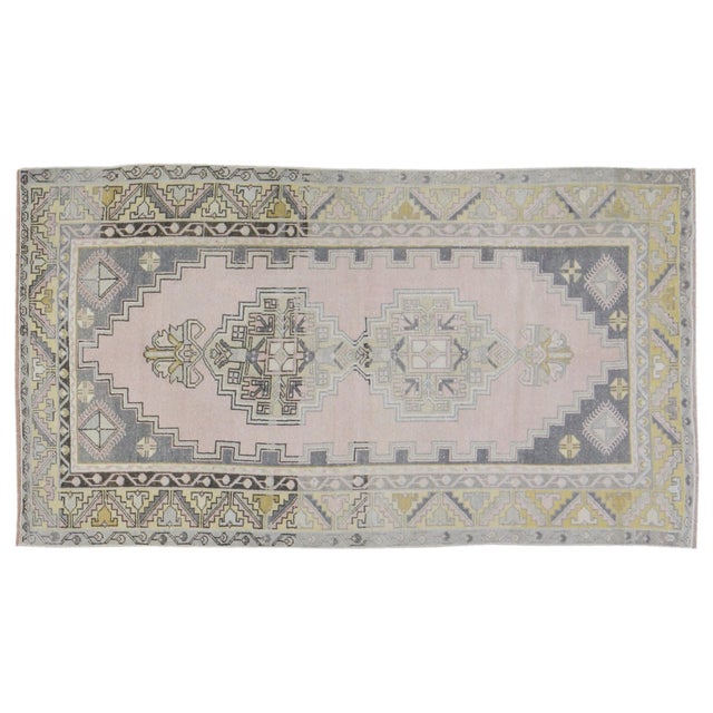 Hand-knotted with care using traditional rug-making techniques, this wool rug blends timeless craftsmanship with a modern...