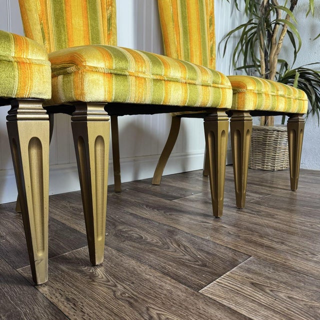 Fun and hard-to-find set of four mid-century Hollywood Regency “Hi Side” chairs, manufactured by Continental Furniture for...