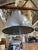 Large 16" wide industrial pendant light fixture featuring a brushed aluminum dome housing with a quick-release safety...