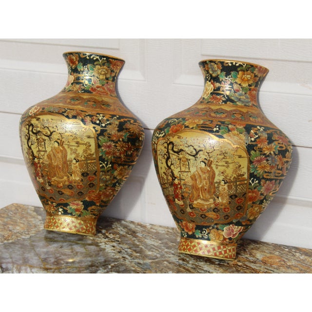This pair of vintage Japanese Royal Satsuma wall pocket vases offers an exquisite example of traditional Japanese hand-...