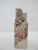 Chinese hand-carved Shoushan soapstone miniature chop seal featuring a foo dog finial atop a mottled red and gray...