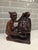 An extraordinary, highly complex mid-century Balinese expressionist realism genre sculpture depicting a traditional...