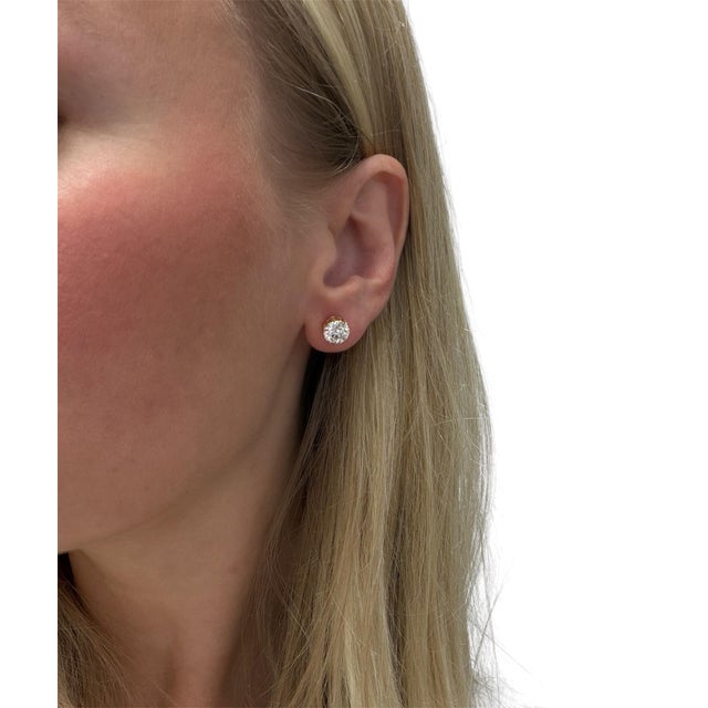 These stunning antique earrings contain two old European Cut diamonds weighing 2.80 carats total. Mounted in 14 karat gold...