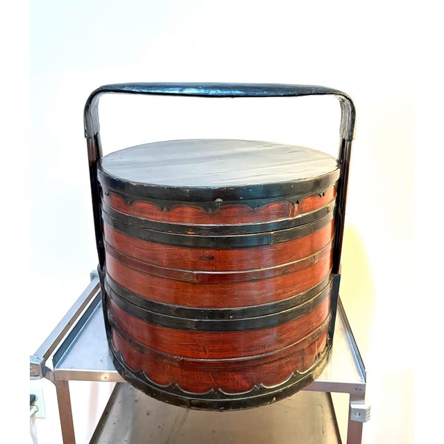 Antique Chinese bamboo large tiered lacquered wedding basket w/ 3 compartments and painted design at top. Basket shows...