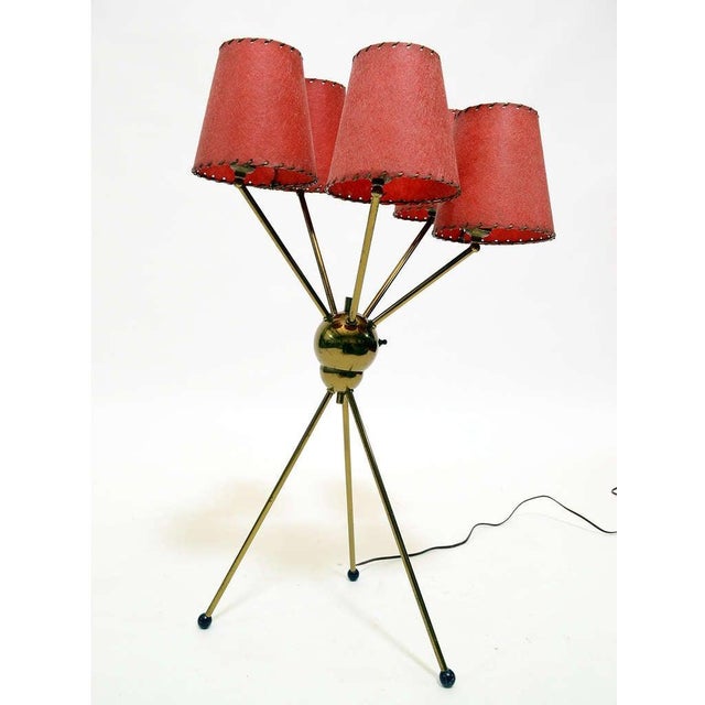 The "Sputnik" lamp was a popular design in the 1950s. The original was designed in 1954 by Gino Sarfatti and made by...