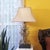 Vintage Maitland-Smith table lamp, handmade in the Philippines, featuring elaborate architectural scrollwork, acanthus-...