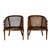 Beautiful pair of vintage faux bamboo barrel chairs with woven cane seats, backs, and sides. The curved frames and bamboo-...
