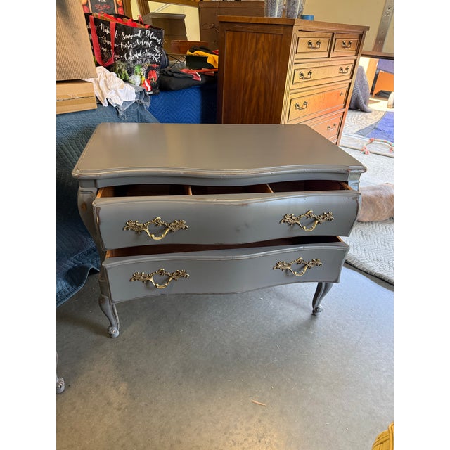 Vintage Bombay-style design • Hand-painted distressed finish • Original-style ornate brass pulls • Two roomy drawers per...
