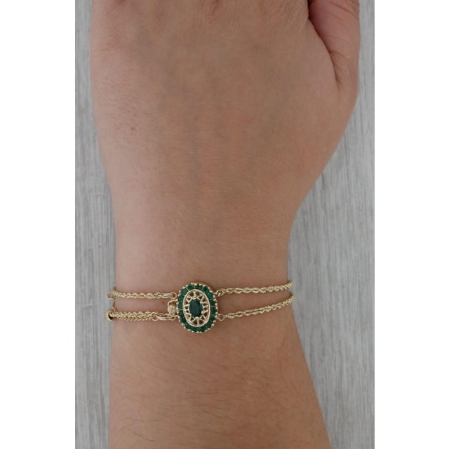 Gemstone Information: - Natural Emerald - Total Carats - 1.12ctw Cut - Oval 0.48ct, Round 0.64ctw Color - Green Treatment...