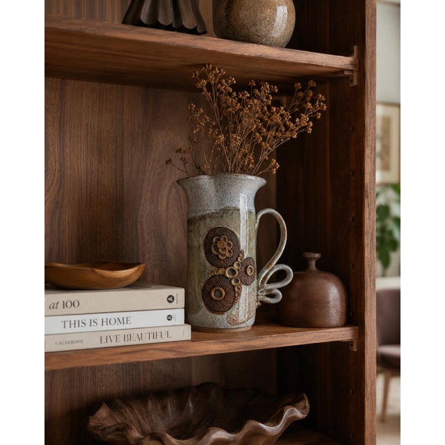 Striking 1970s Mid-Century studio pottery pitcher vase featuring a tall cylindrical form, dramatically flared rim, and an...