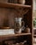 Striking 1970s Mid-Century studio pottery pitcher vase featuring a tall cylindrical form, dramatically flared rim, and an...