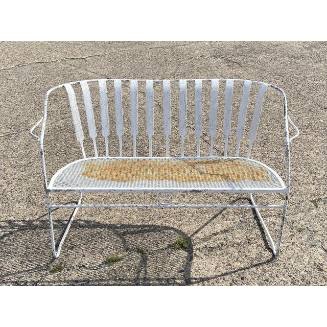 Vintage Mid Century Modern Wrought Iron Sculptural Garden Patio Loveseat Sofa. Item features wrought iron construction,...