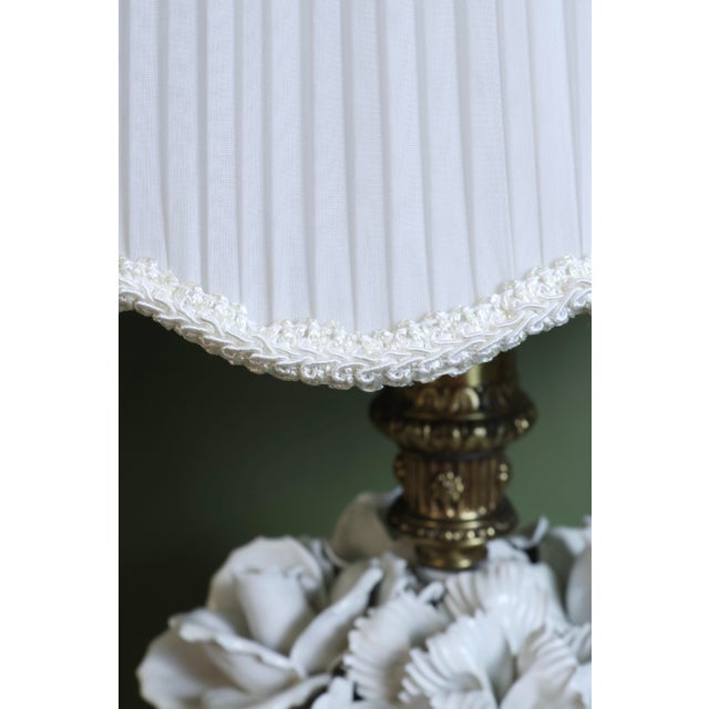 Elevate your space with this stunning, grand-scale pair of vintage mid-century Hollywood Regency banquet table lamps....