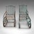 This is an antique garden lounger set. An English, wrought iron rocker and steamer chair, dating to the Edwardian period,...