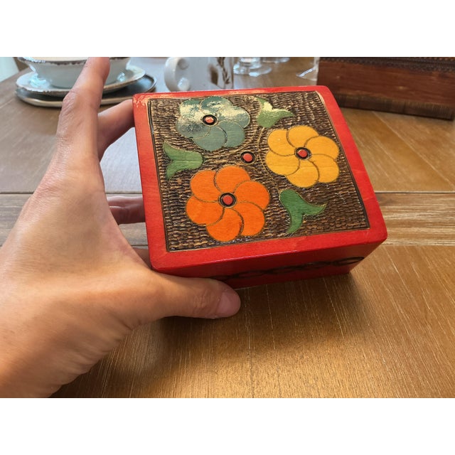 Add a bold, artisan pop of color to your vanity, bedside table, or bookshelf with this handcrafted Polish wooden keepsake...