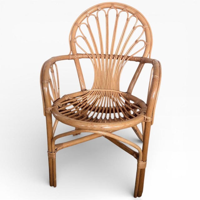 The Italian bamboo armchair is a beautifully crafted mid century armchair designed to bring timeless style and comfort to...